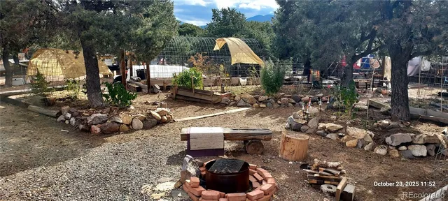 a view of a backyard of house with a mountain