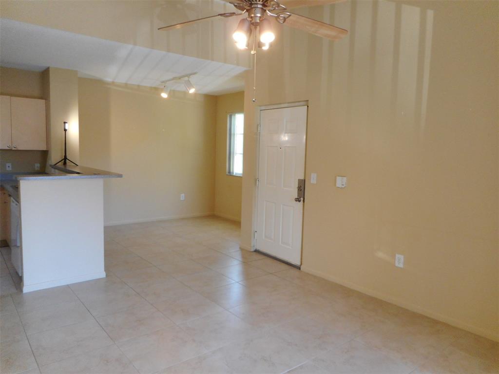 7970 North Nob Hill Road, Unit 207 Tamarac, FL 33321 - Photo 4 of 22 a view of a livingroom with a bathroom