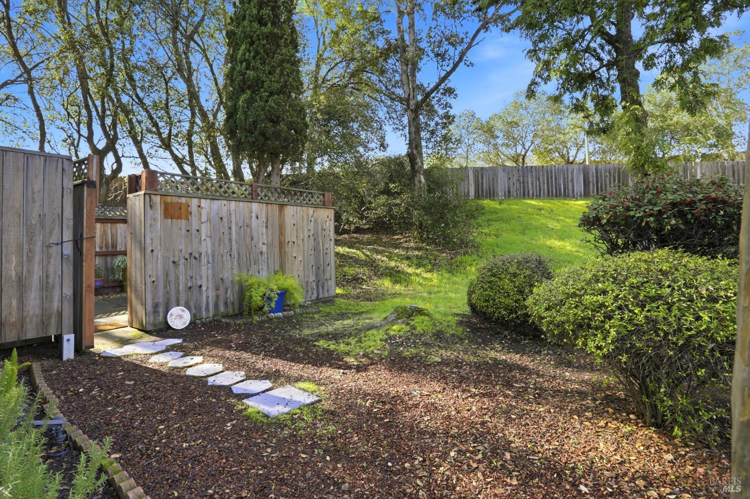 49 Livingston Court Novato, CA 94949 - Photo 20 of 21 back gate to patio and adjacent greenbelt area