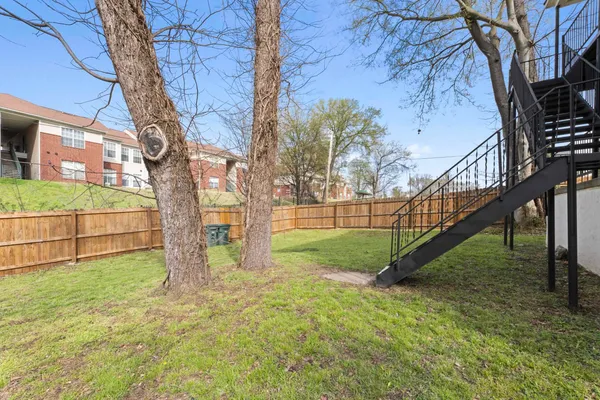 a view of a yard with a trees