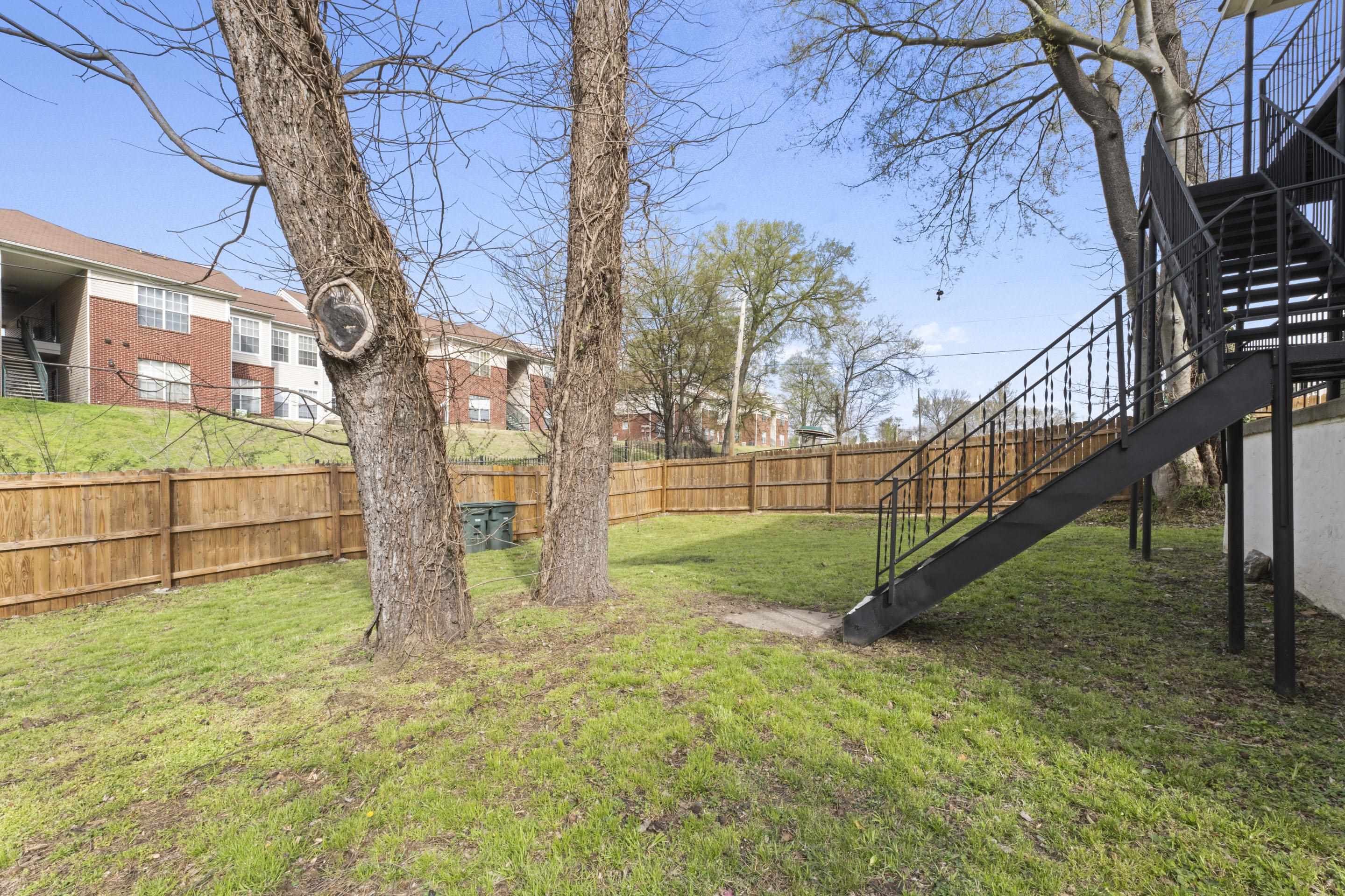 1493 Gaither Street Memphis, TN 38106 - Photo 3 of 27 a view of a yard with a trees