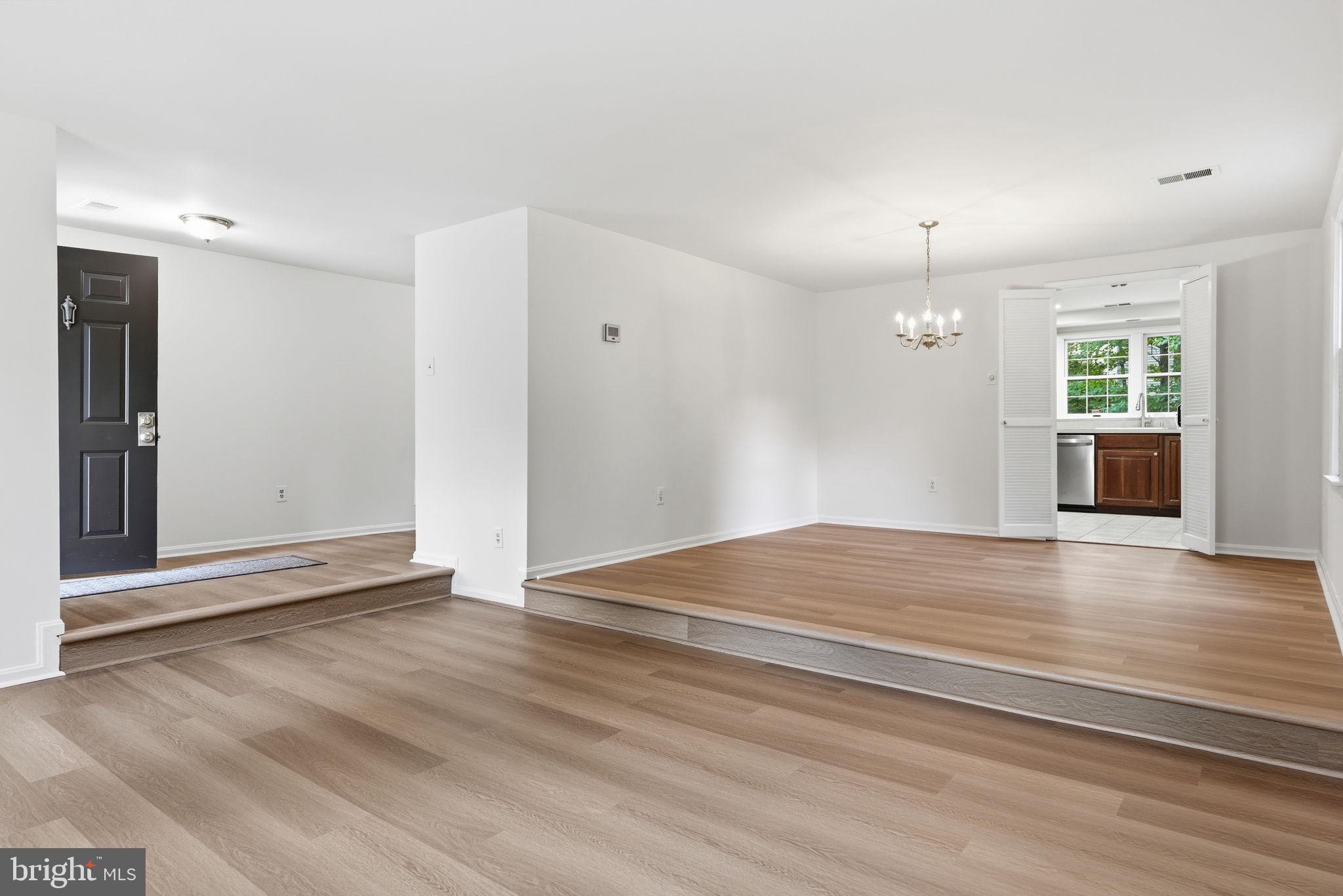 6017 Misty Arch Run Columbia, MD 21044 - Photo 4 of 39 Spacious, light-filled living area.