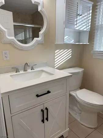a bathroom with a sink and a toilet