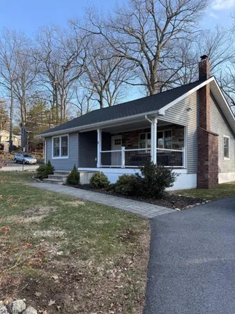 a view of a yard in front of a house