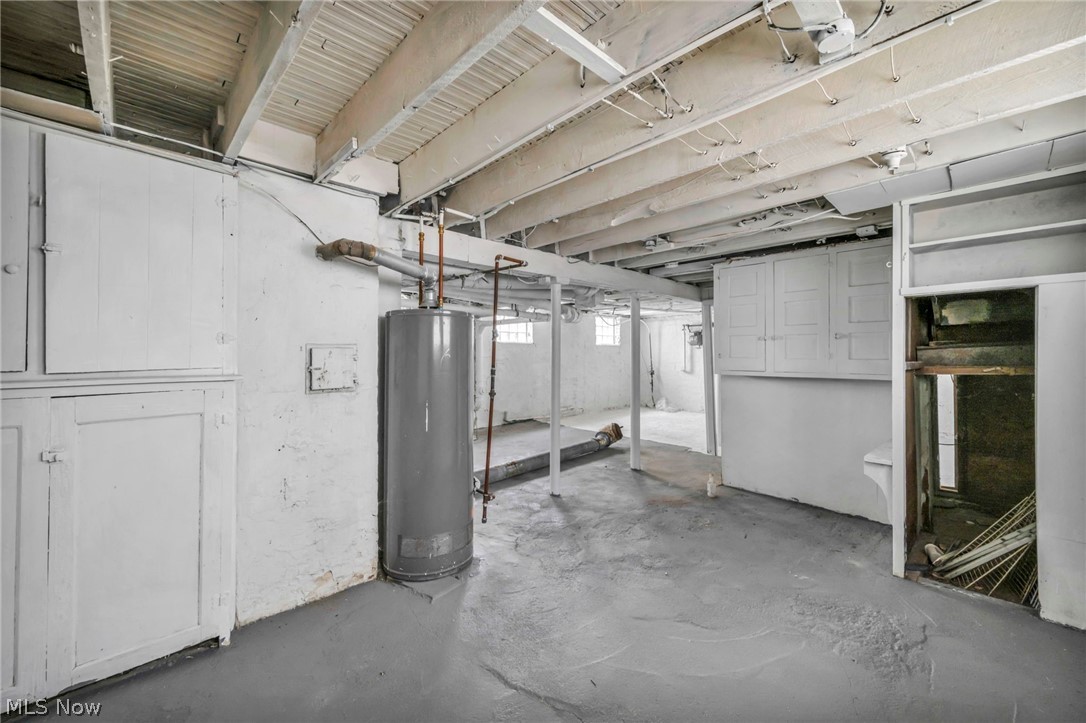 1677 Carlyon Road East Cleveland, OH 44112 - Photo 35 of 41 Below grade area with water heater