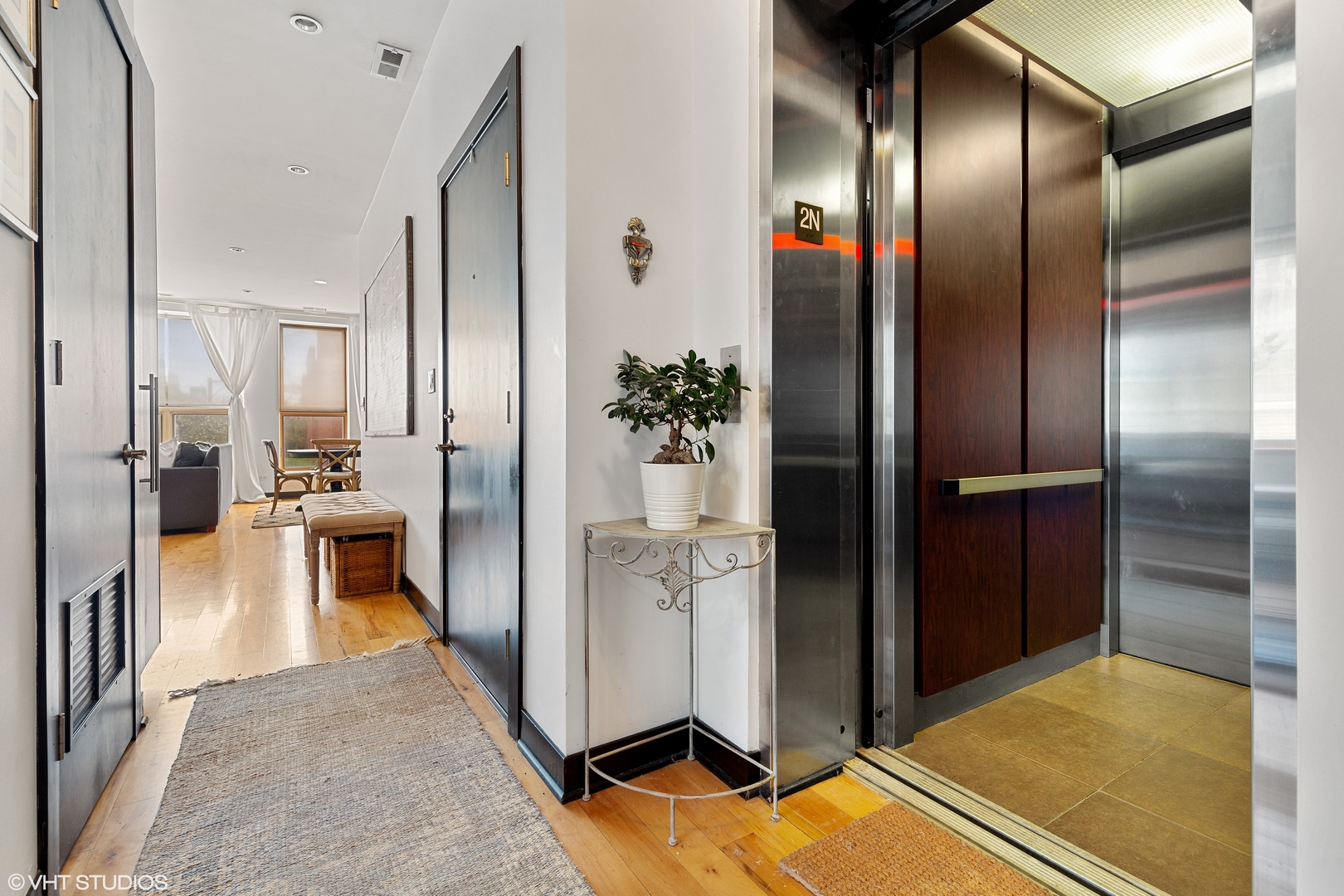 1842 North Damen Avenue, Unit 2N Chicago, IL 60647 - Photo 2 of 14 a view of kitchen with windows and refrigerator