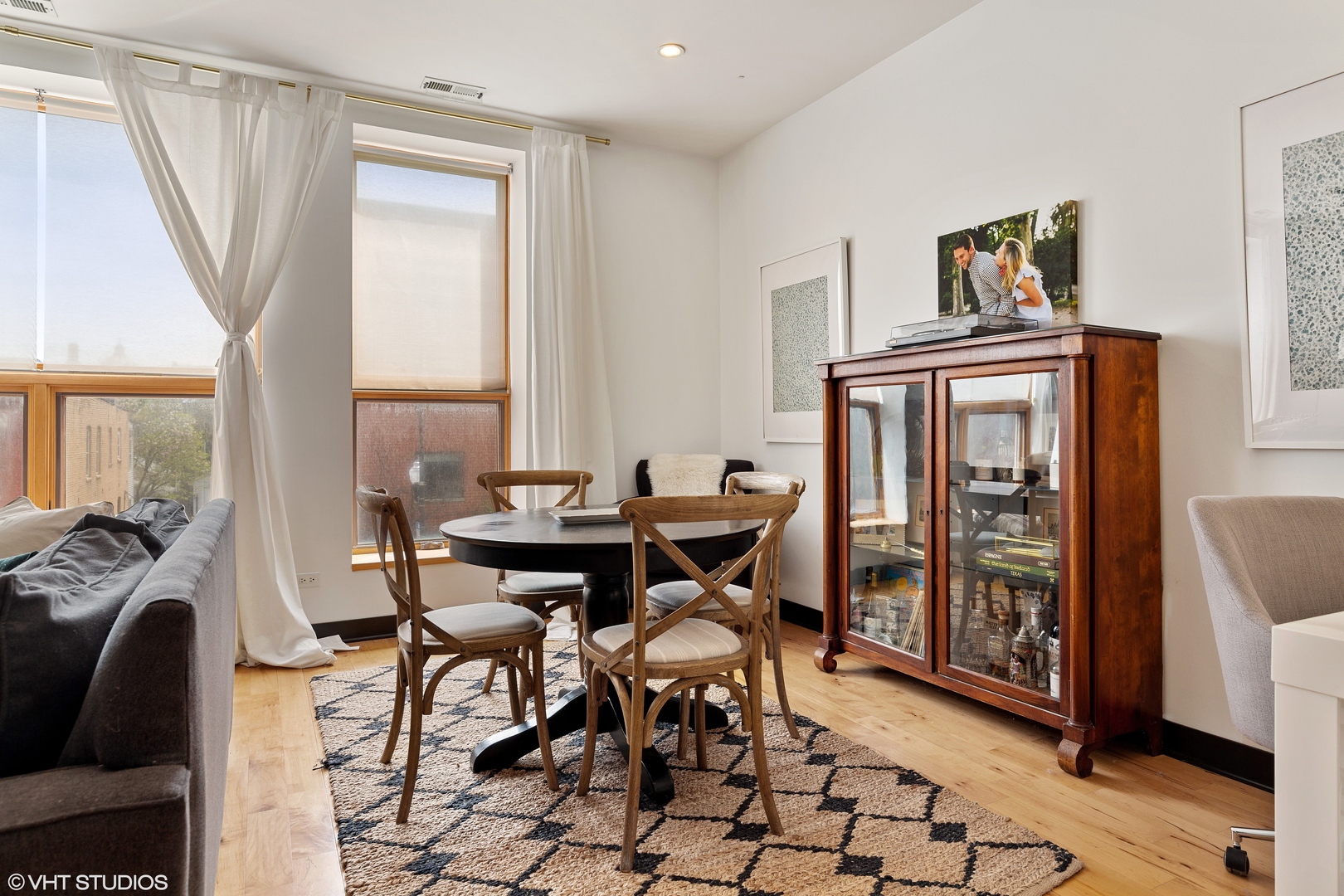 1842 North Damen Avenue, Unit 2N Chicago, IL 60647 - Photo 6 of 14 a view of a dining room with furniture and a window