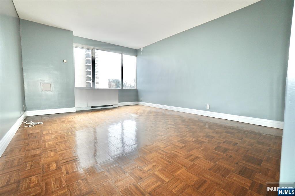 5 Horizon Road, Unit 203 Fort Lee, NJ 07024 - Photo 23 of 27 a view of an empty room with a window