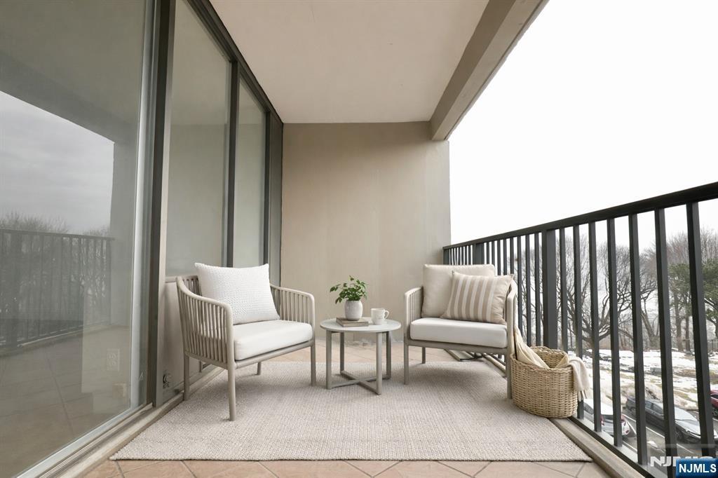 5 Horizon Road, Unit 203 Fort Lee, NJ 07024 - Photo 7 of 27 a outdoor living space with furniture and white walls
