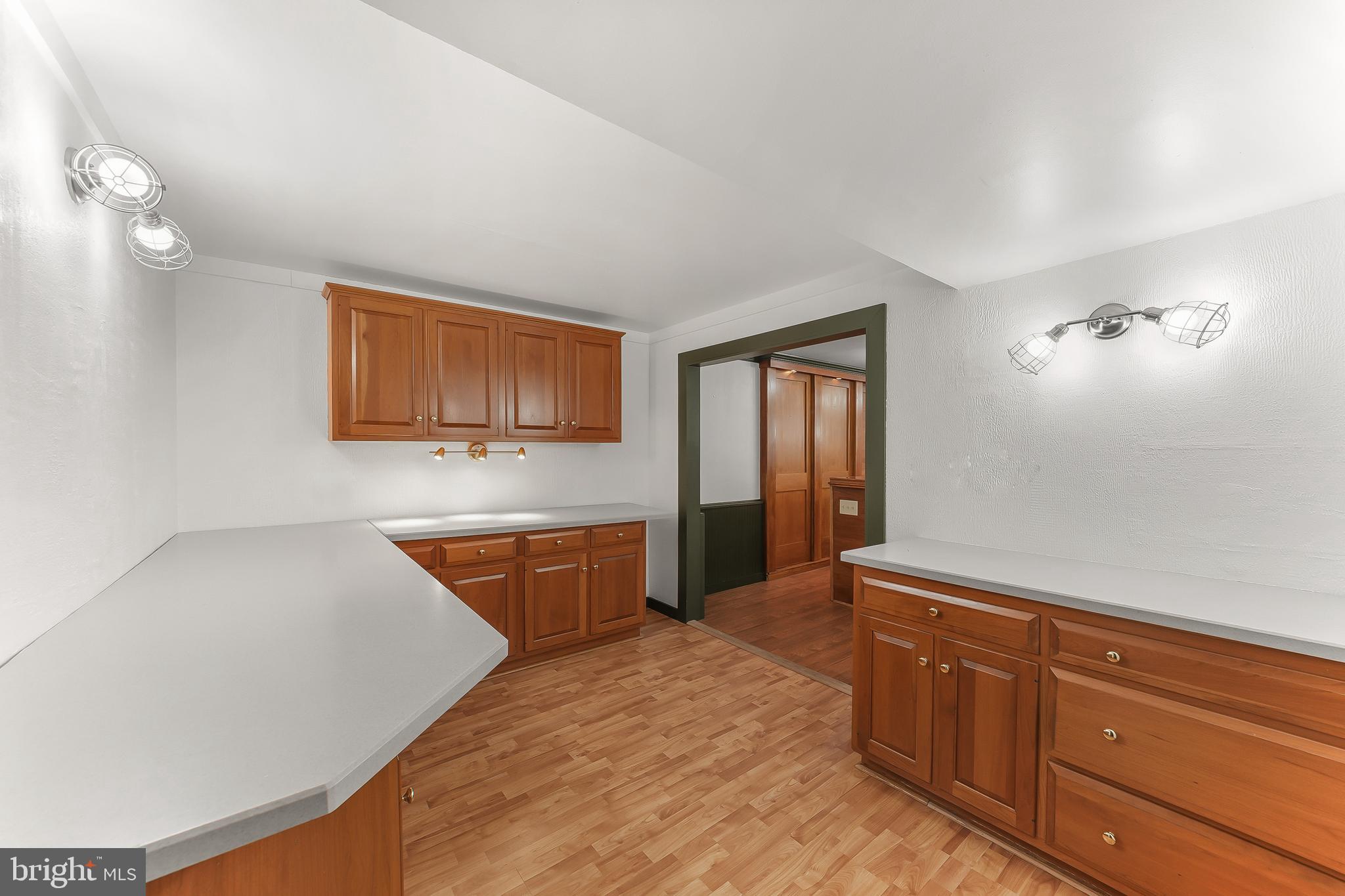 124 Round Hill Road Kennett Square, PA 19348 - Photo 44 of 55 Lower Level Craft room with Built in Cabinetry