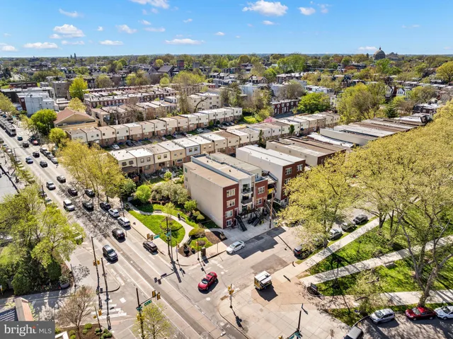 a view of a city with an ocean view