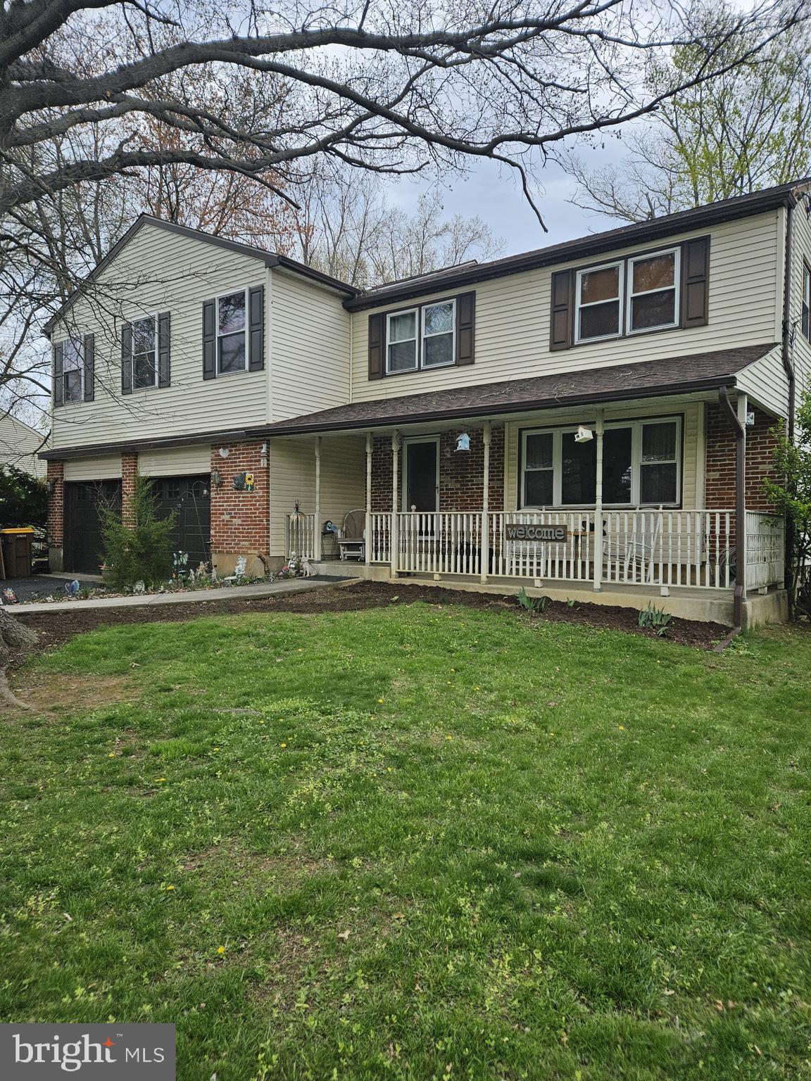223 Valley Road Yardley, PA 19067 - Photo 1 of 44 a front view of a house with a yard