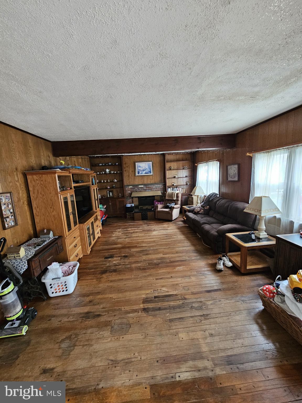 223 Valley Road Yardley, PA 19067 - Photo 12 of 44 a living room with furniture and a flat screen tv