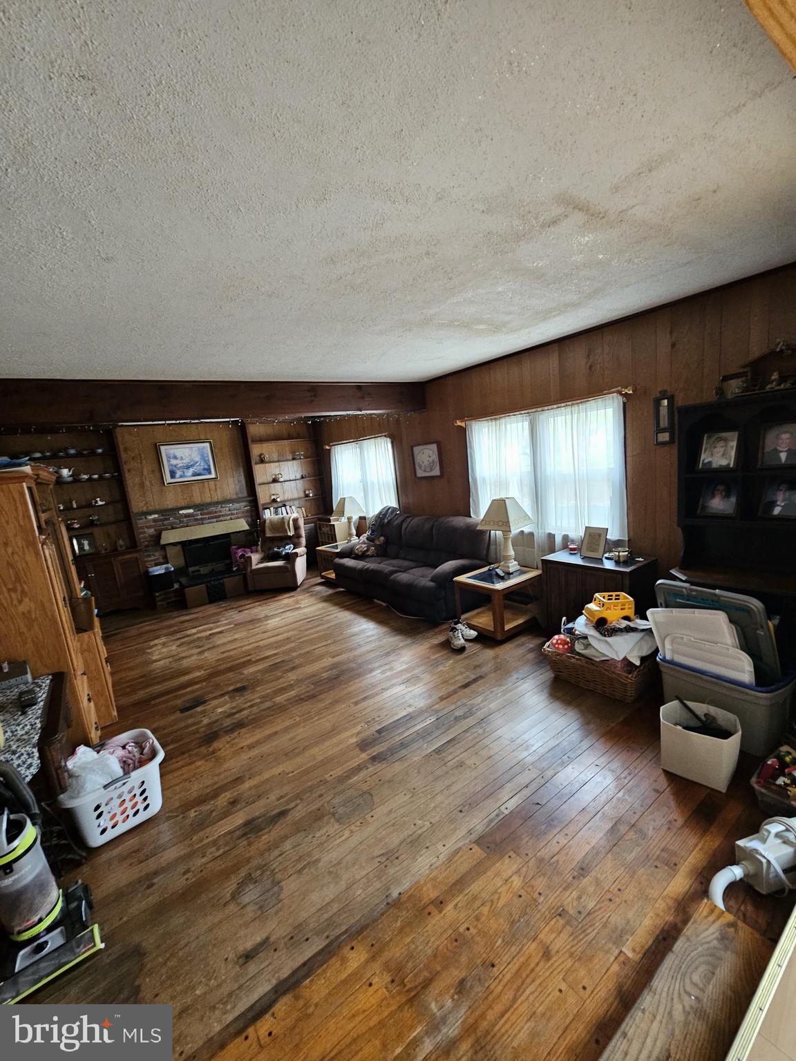 223 Valley Road Yardley, PA 19067 - Photo 13 of 44 a living room with furniture and a flat screen tv