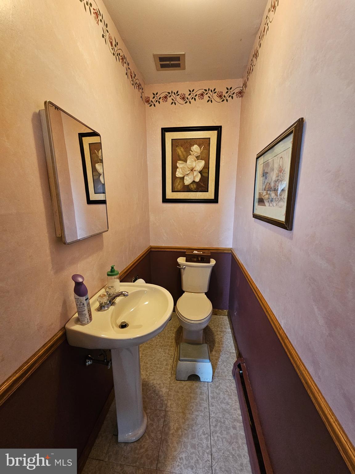 223 Valley Road Yardley, PA 19067 - Photo 14 of 44 a bathroom with a sink mirror and toilet