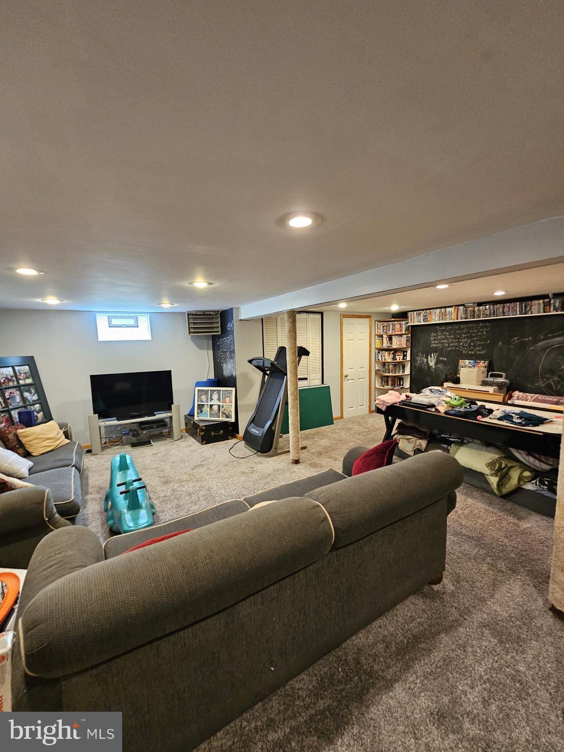 223 Valley Road Yardley, PA 19067 - Photo 17 of 44 a living room with furniture and a flat screen tv