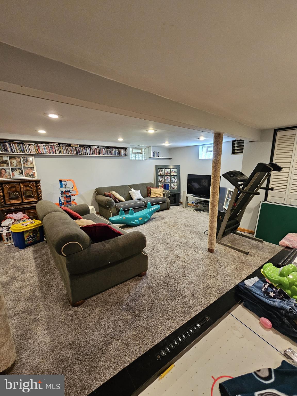 223 Valley Road Yardley, PA 19067 - Photo 18 of 44 a living room with furniture and a flat screen tv