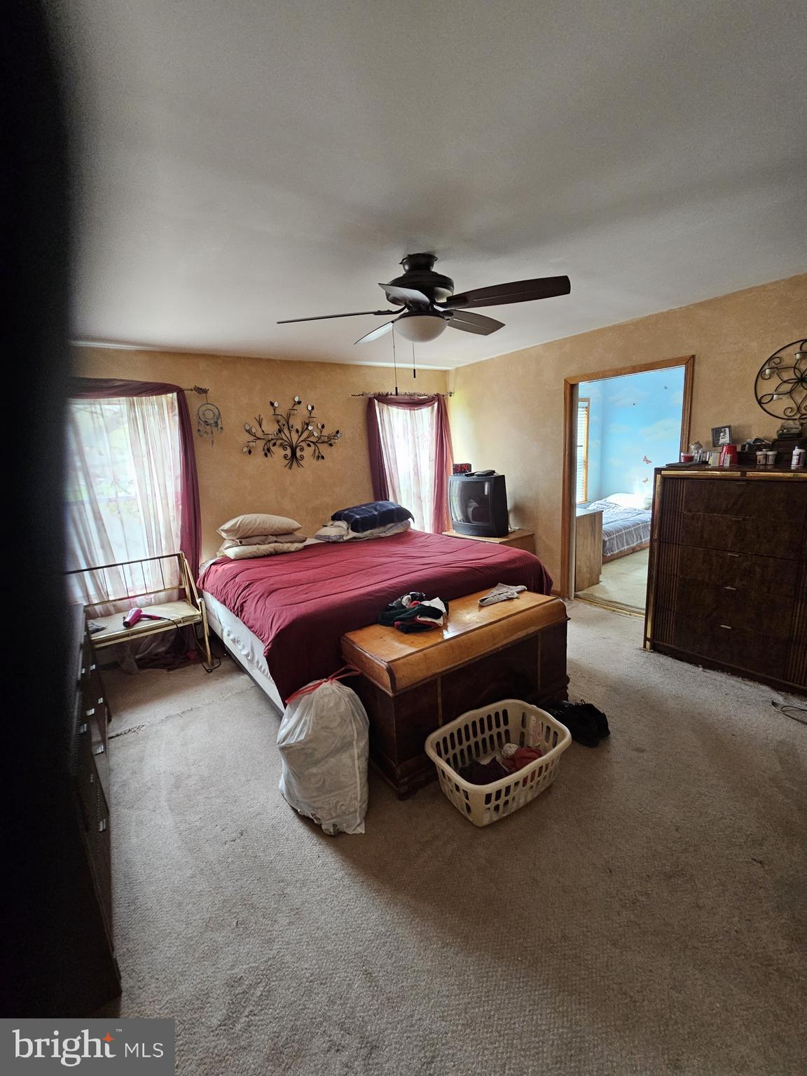 223 Valley Road Yardley, PA 19067 - Photo 21 of 44 a bed room with a bed and a couch