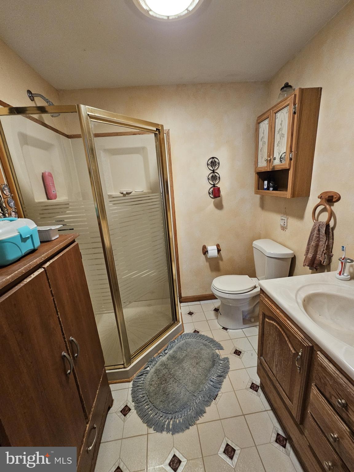 223 Valley Road Yardley, PA 19067 - Photo 23 of 44 a bathroom with a sink toilet and shower