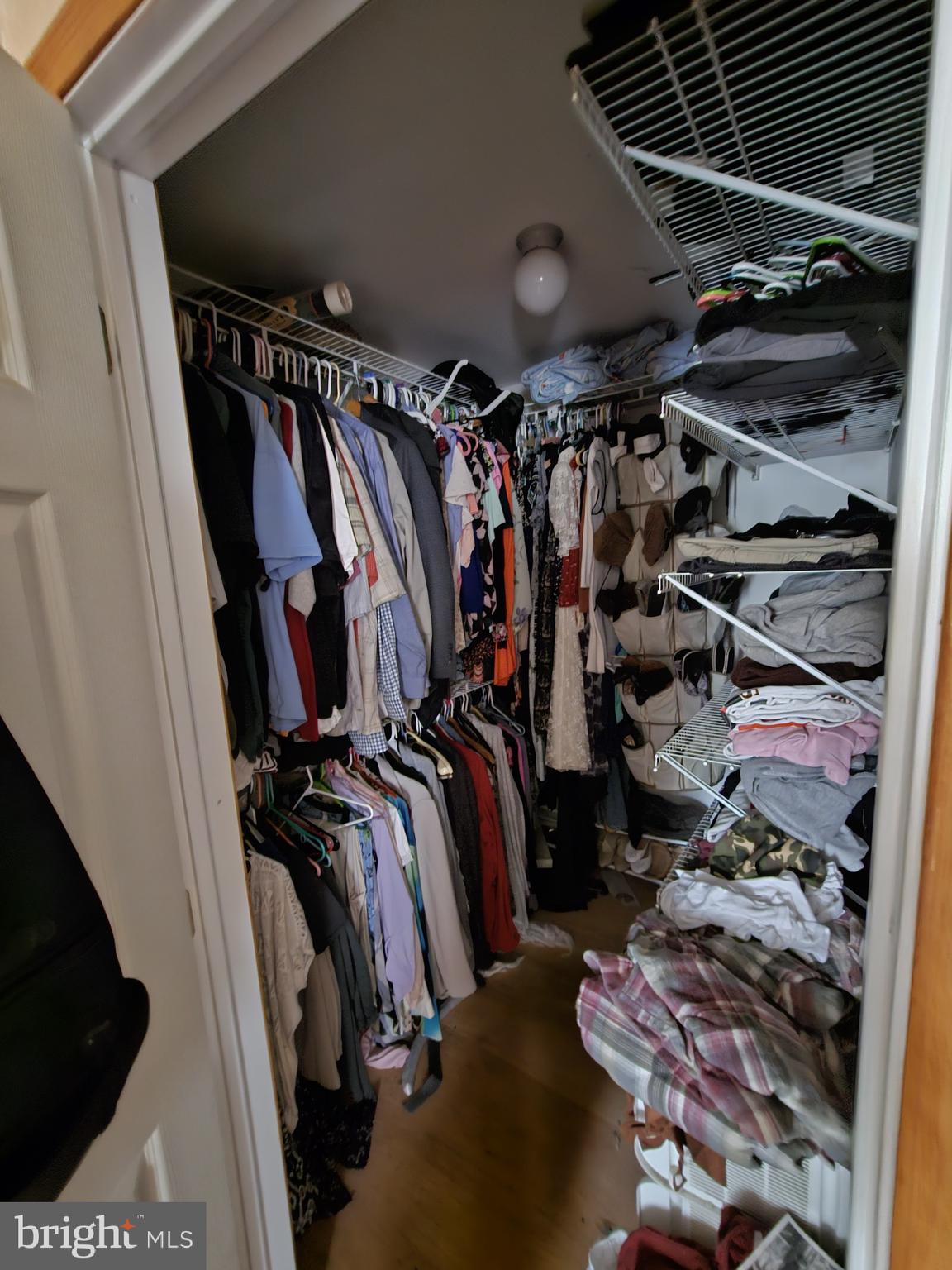 223 Valley Road Yardley, PA 19067 - Photo 24 of 44 a view of walk in closet with clothes and shoes