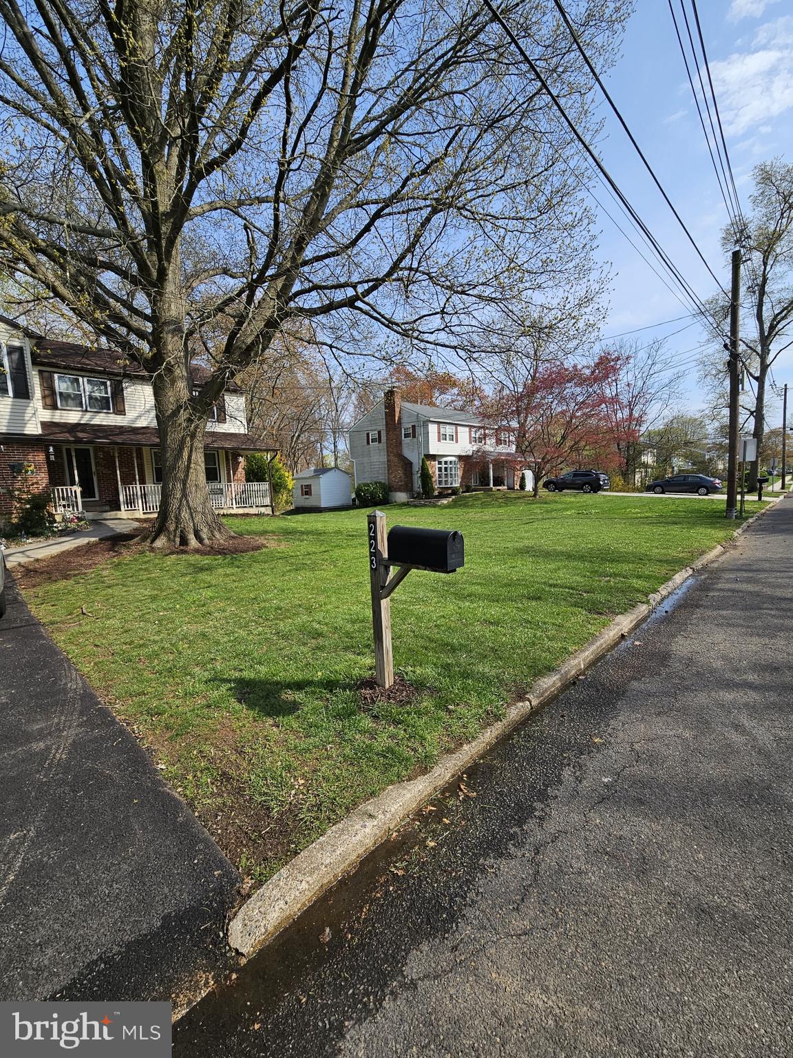 223 Valley Road Yardley, PA 19067 - Photo 3 of 44 a view of a park with large trees
