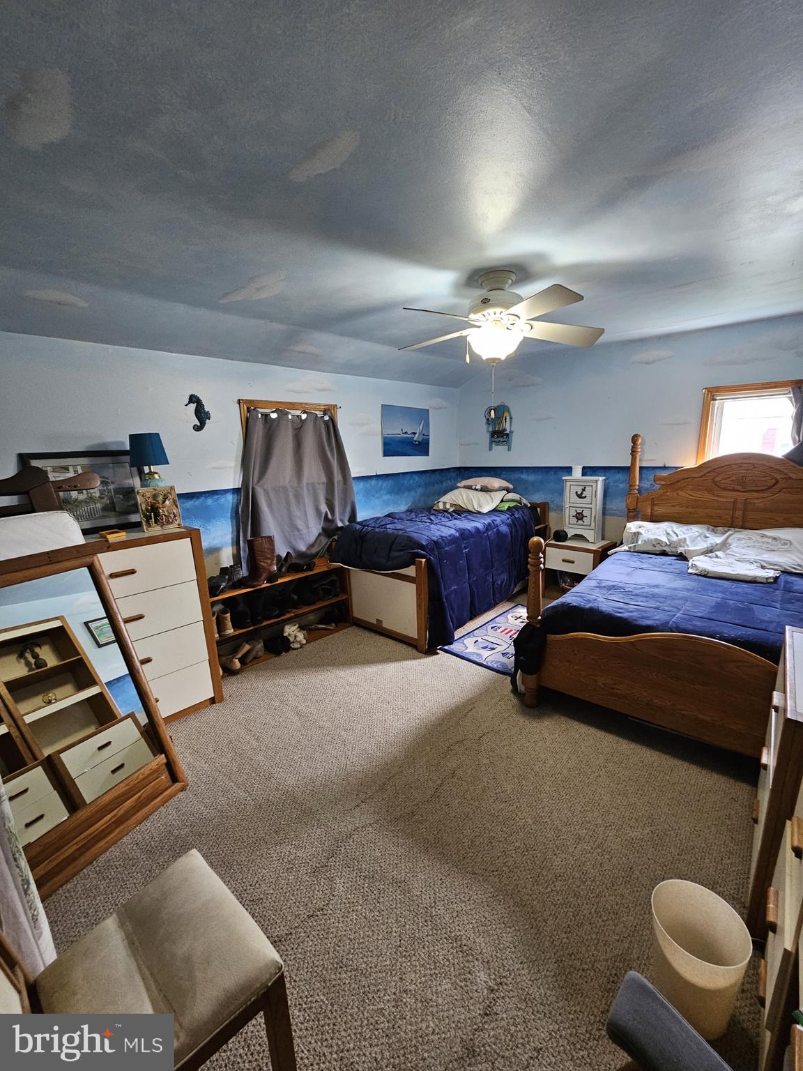 223 Valley Road Yardley, PA 19067 - Photo 32 of 44 a bedroom with furniture and a lamp