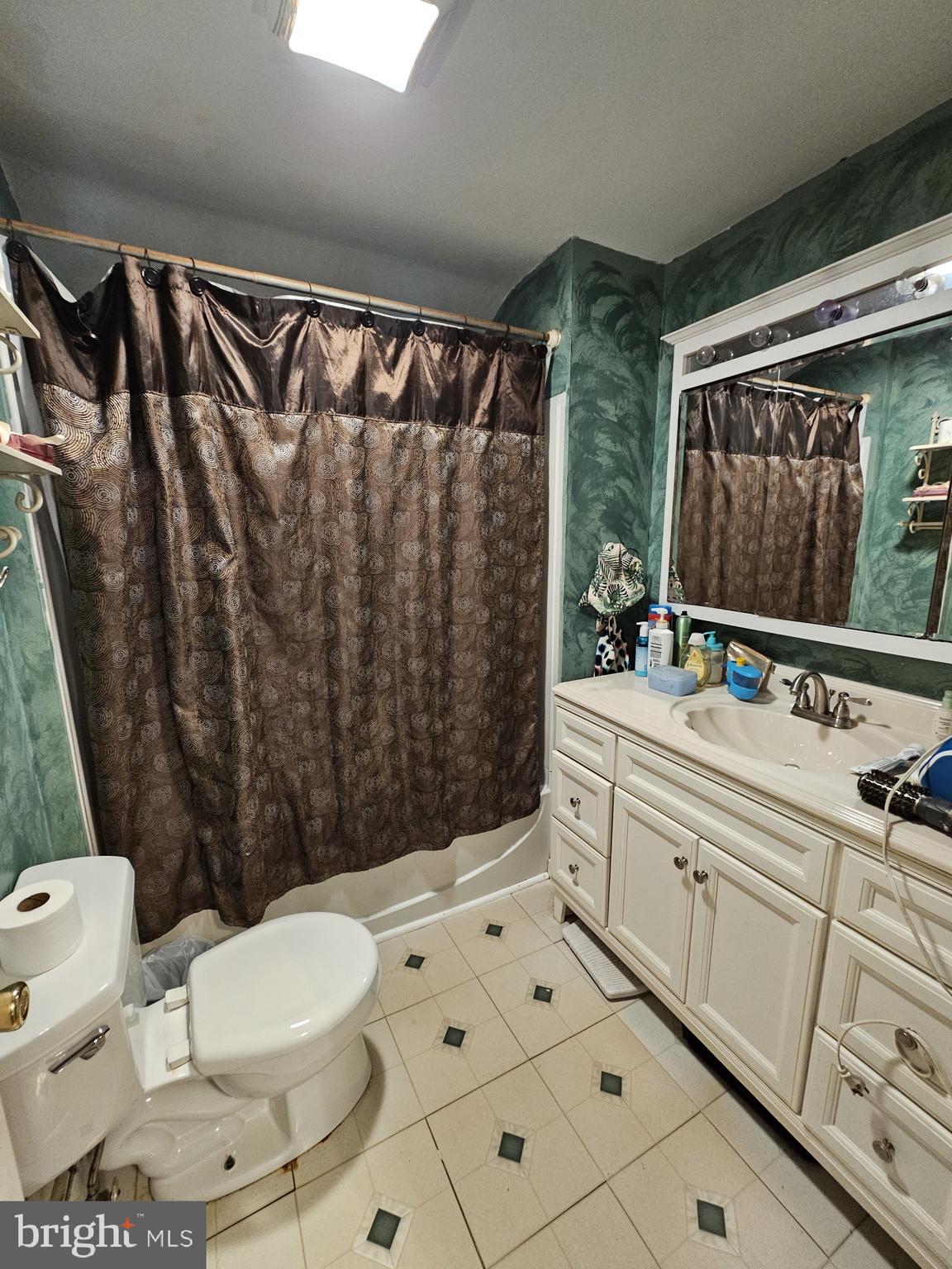 223 Valley Road Yardley, PA 19067 - Photo 37 of 44 a bathroom with a sink a toilet and shower