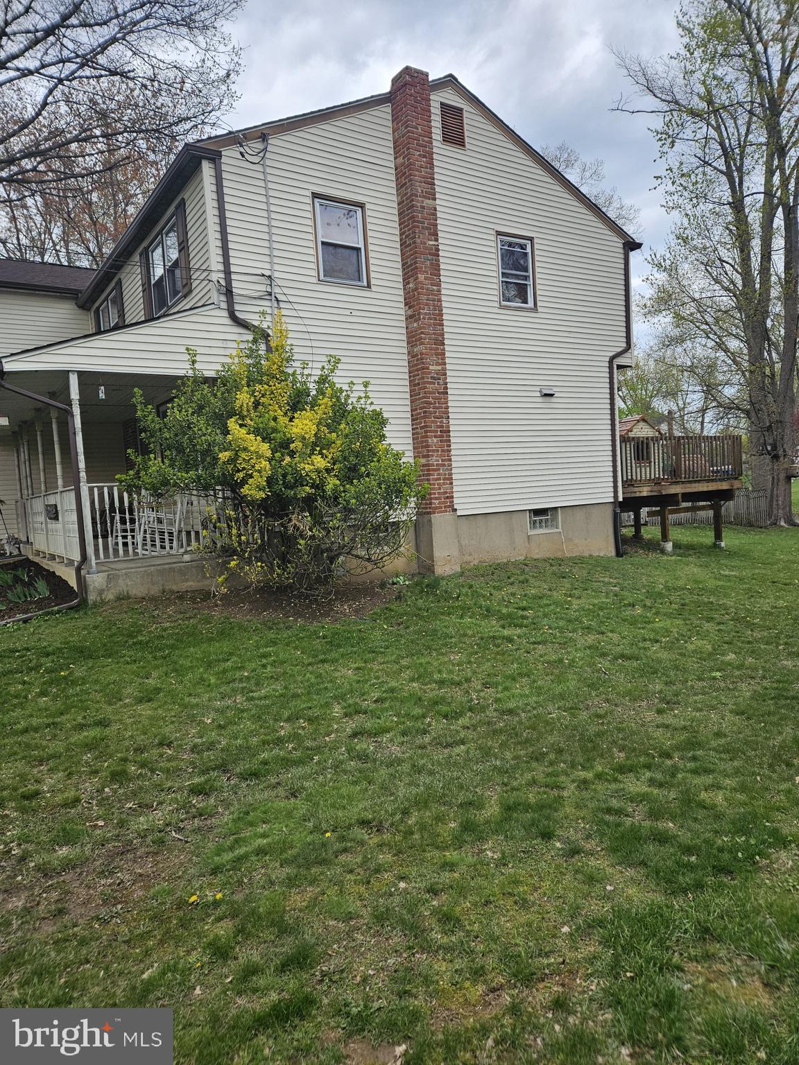 223 Valley Road Yardley, PA 19067 - Photo 4 of 44 a front view of a house with garden