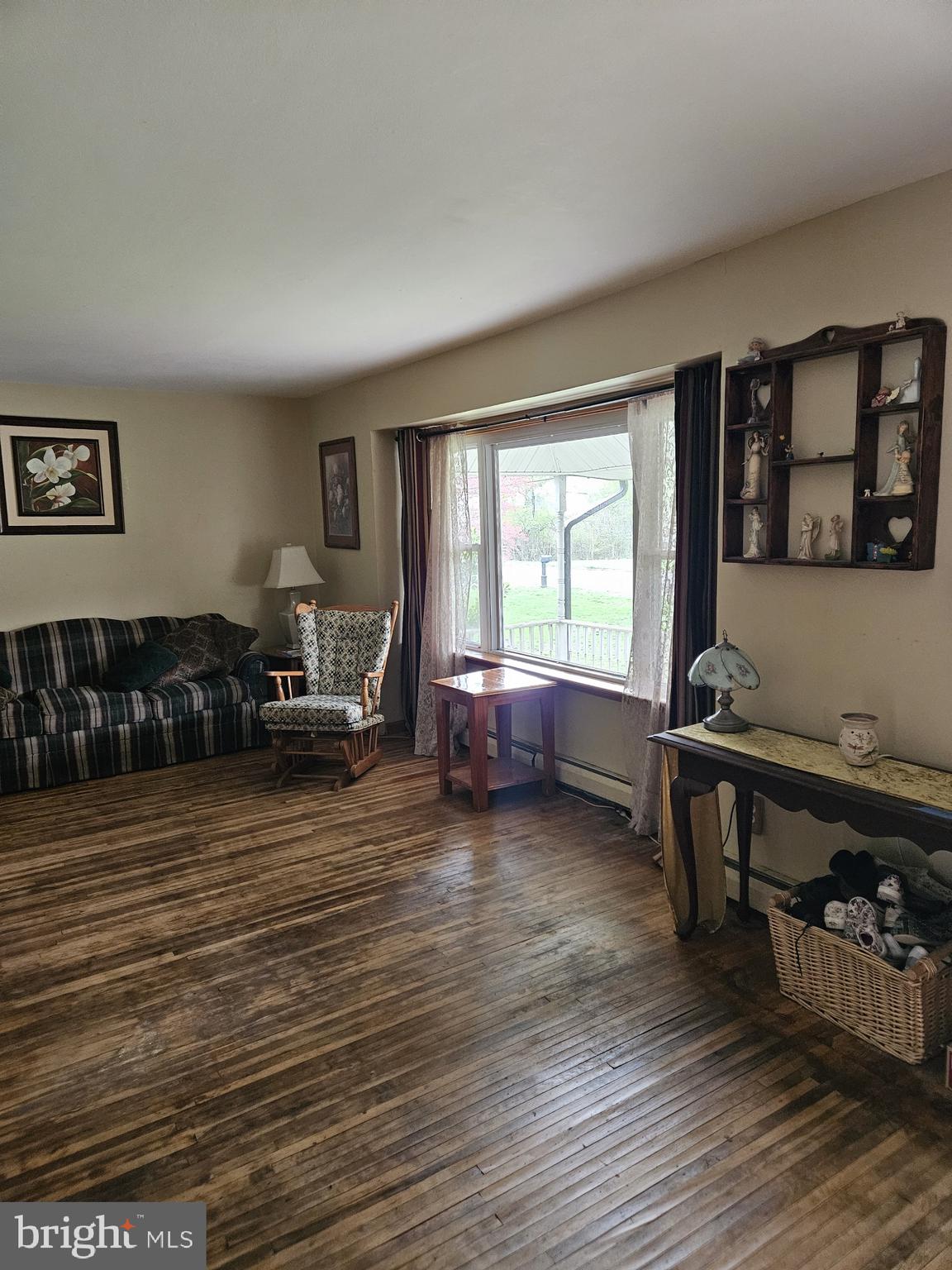 223 Valley Road Yardley, PA 19067 - Photo 8 of 44 a living room with furniture and a wooden floor