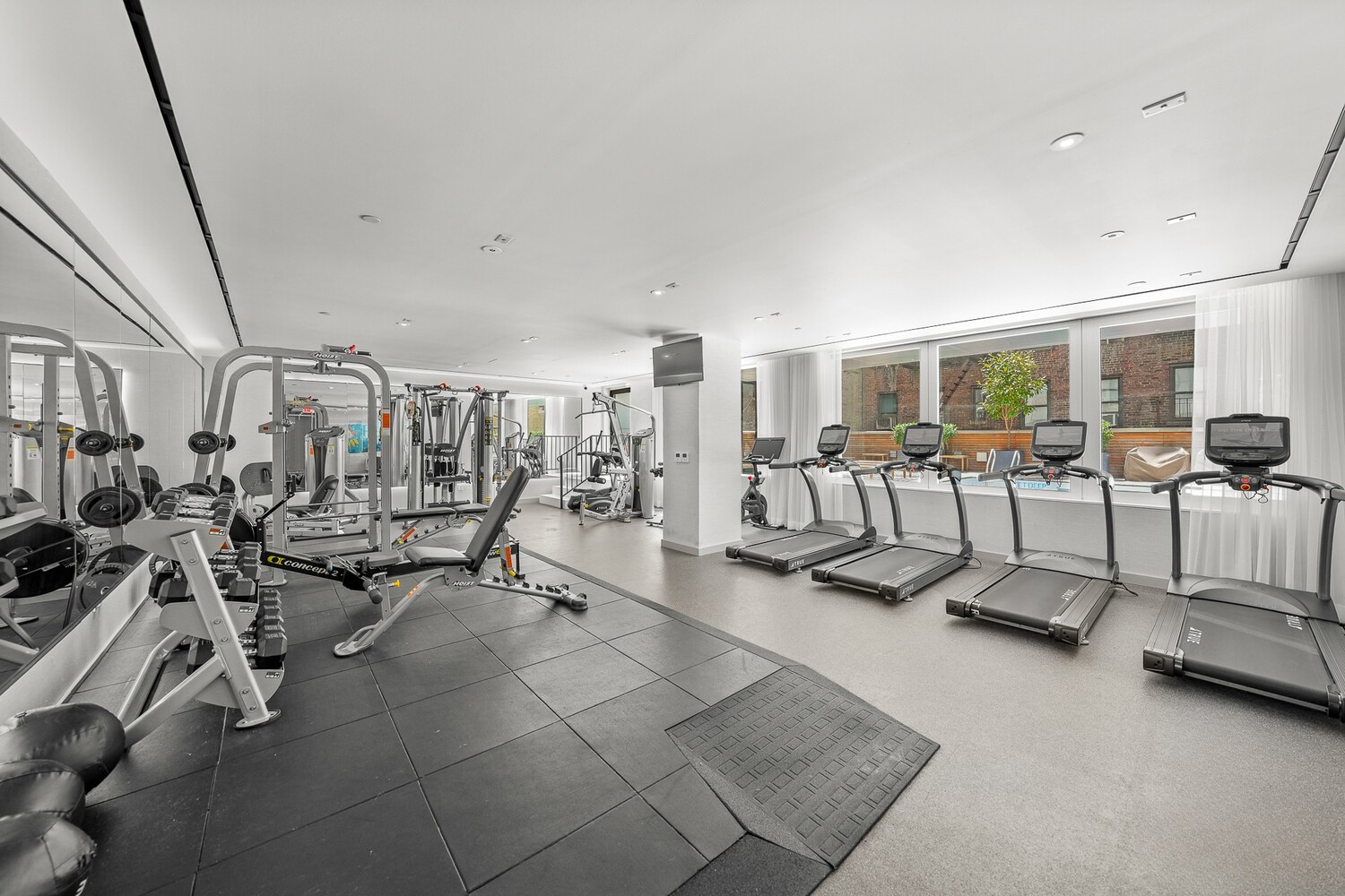 150 East 23rd Street, Unit 4C Manhattan, NY 10010 - Photo 10 of 12 a view of a room with gym equipment