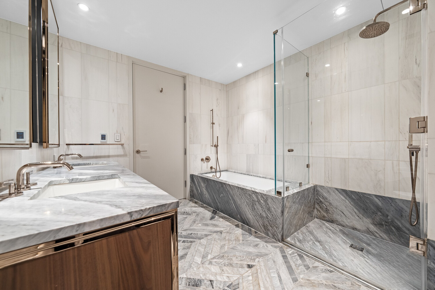 150 East 23rd Street, Unit 4C Manhattan, NY 10010 - Photo 8 of 12 a bathroom with a sink and a mirror