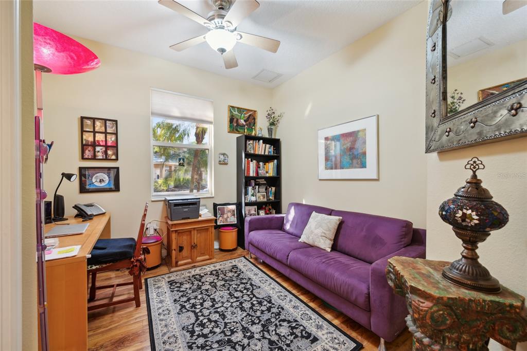 7246 Gaberia Road New Port Richey, FL 34655 - Photo 12 of 45 a living room with furniture and wooden floor