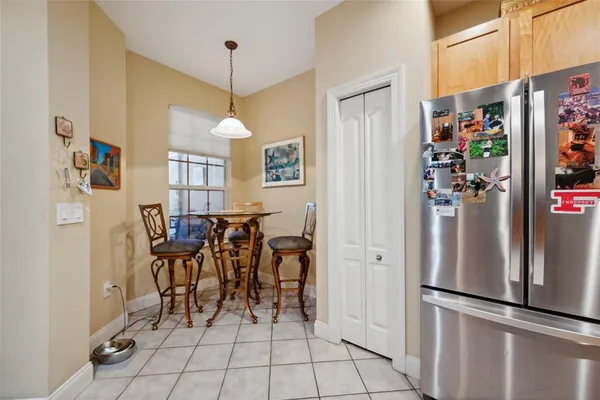 a view of a hallway and a livingroom with furniture