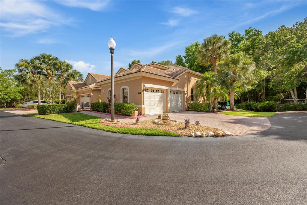 7246 Gaberia Road New Port Richey, FL 34655 - Photo 2 of 45 a front view of a house with a yard