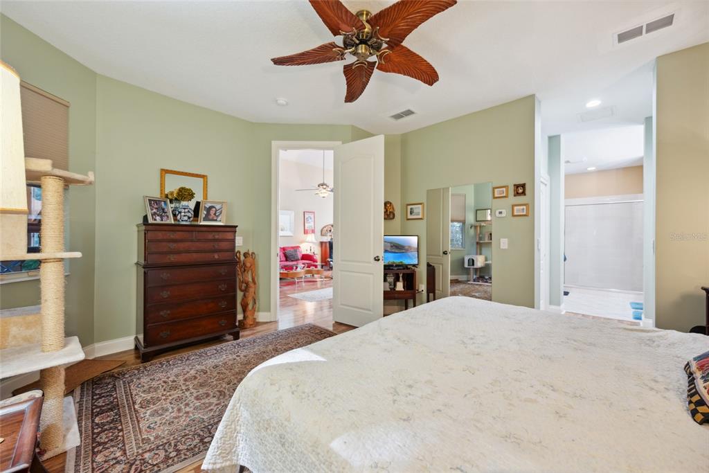 7246 Gaberia Road New Port Richey, FL 34655 - Photo 22 of 45 a bedroom with a bed and a dresser