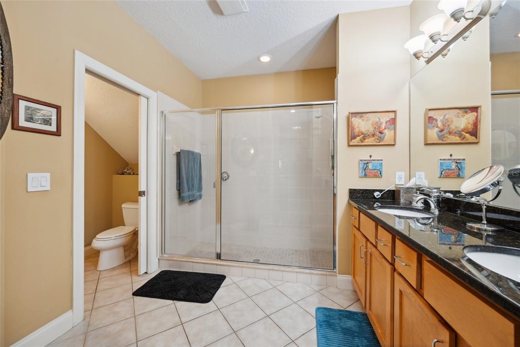 7246 Gaberia Road New Port Richey, FL 34655 - Photo 23 of 45 a kitchen with stainless steel appliances granite countertop a refrigerator and a sink