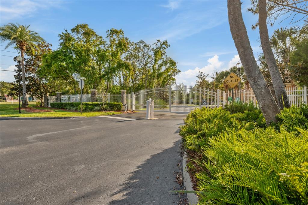 7246 Gaberia Road New Port Richey, FL 34655 - Photo 40 of 45 a view of a swimming pool with an outdoor space and seating area