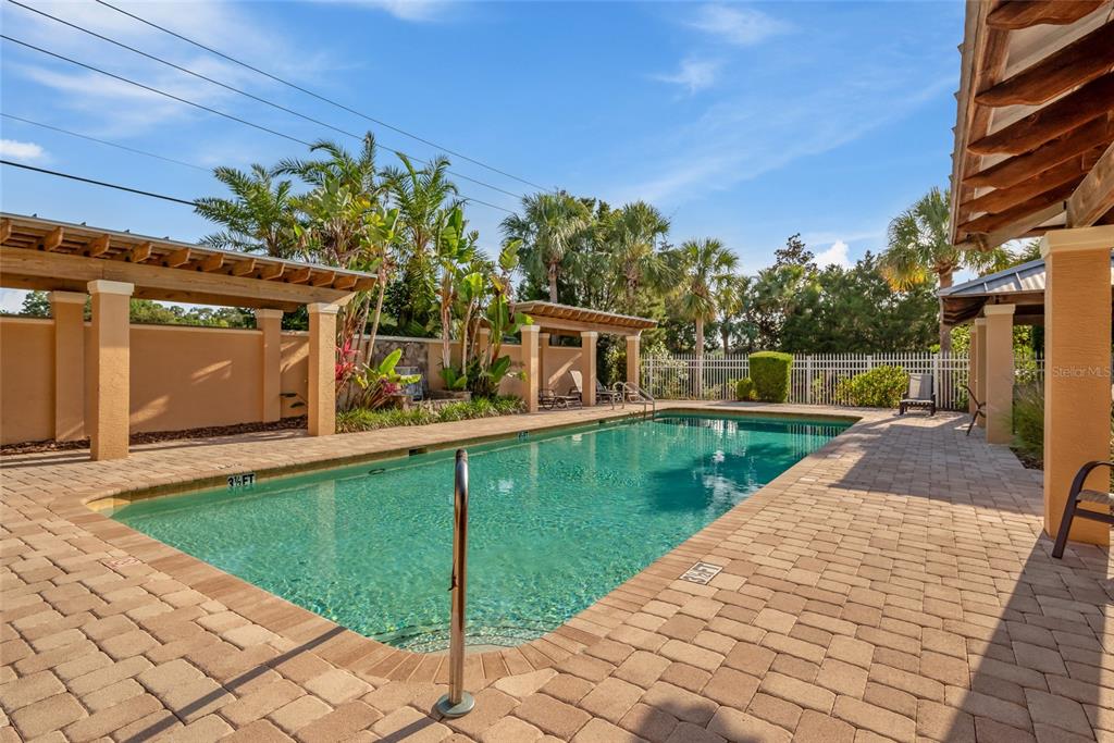 7246 Gaberia Road New Port Richey, FL 34655 - Photo 42 of 45 a view of a swimming pool with a yard