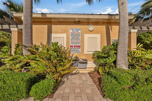 a view of balcony with wooden floor and fence