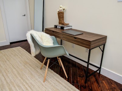 4510 Maxie Street, Unit B Houston, TX 77007 - Photo 15 of 39 a room with a table chairs and wooden floor