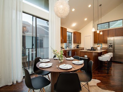 4510 Maxie Street, Unit B Houston, TX 77007 - Photo 28 of 39 a view of a dining room with furniture and wooden floor