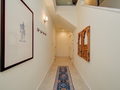 4510 Maxie Street, Unit B Houston, TX 77007 - Photo 39 of 39 a view of a hallway with wooden floor