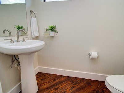 4510 Maxie Street, Unit B Houston, TX 77007 - Photo 8 of 39 a bathroom with a sink and a mirror