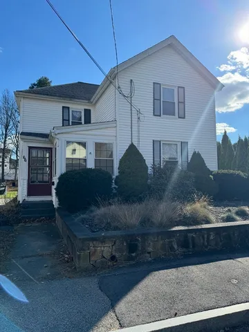 a front view of a house with entertaining space
