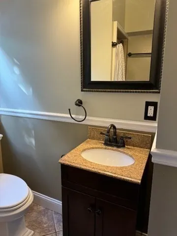 a bathroom with a sink and a toilet