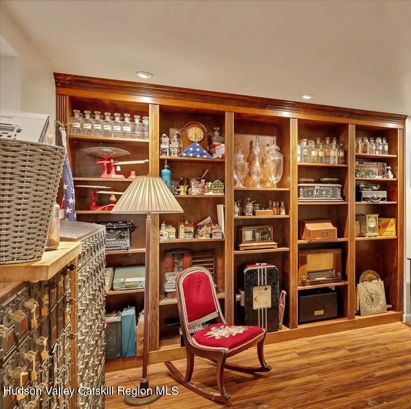 126 Storks Nest Road Round Top, NY 12473 - Photo 25 of 44 a chair and table in a room