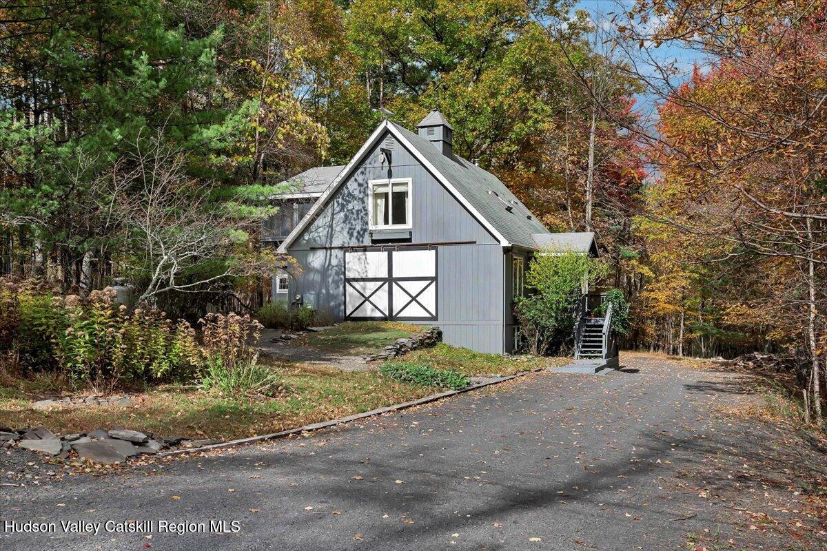 126 Storks Nest Road Round Top, NY 12473 - Photo 35 of 44 a view of a house with a yard