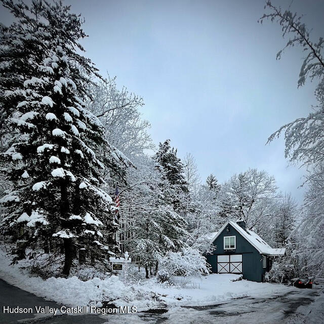 126 Storks Nest Road Round Top, NY 12473 - Photo 40 of 43 a view of a house with a tree in the background