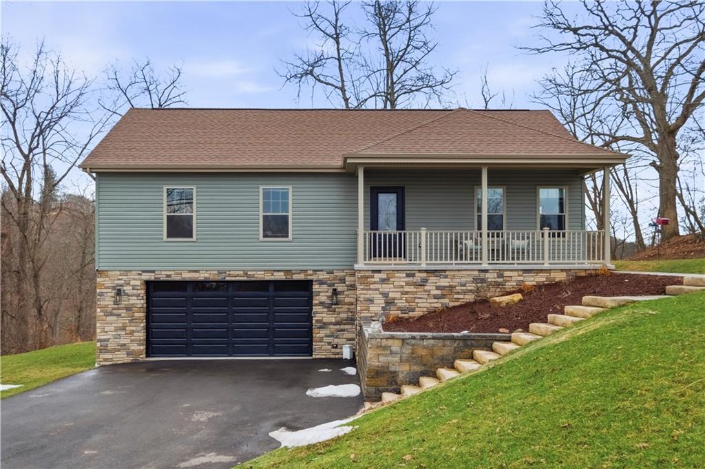 2388 Ridge Road Extension Ambridge, PA 15003 - Photo 1 of 44 a front view of a house with garden