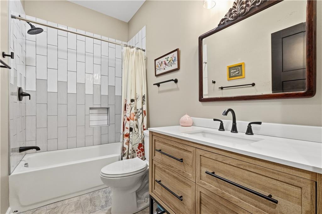 2388 Ridge Road Extension Ambridge, PA 15003 - Photo 28 of 44 a bathroom with a sink a toilet and a bathtub
